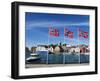 Norwegian Flags and Historic Harbour Warehouses, Stavanger, Norway, Scandinavia, Europe-Christian Kober-Framed Premium Photographic Print