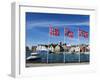 Norwegian Flags and Historic Harbour Warehouses, Stavanger, Norway, Scandinavia, Europe-Christian Kober-Framed Premium Photographic Print