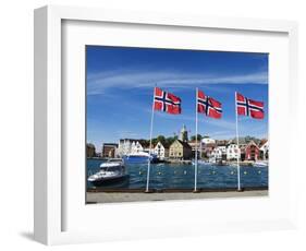 Norwegian Flags and Historic Harbour Warehouses, Stavanger, Norway, Scandinavia, Europe-Christian Kober-Framed Photographic Print