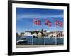 Norwegian Flags and Historic Harbour Warehouses, Stavanger, Norway, Scandinavia, Europe-Christian Kober-Framed Photographic Print