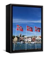 Norwegian Flags and Historic Harbour Warehouses, Stavanger, Norway, Scandinavia, Europe-Christian Kober-Framed Stretched Canvas