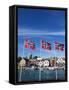 Norwegian Flags and Historic Harbour Warehouses, Stavanger, Norway, Scandinavia, Europe-Christian Kober-Framed Stretched Canvas