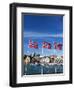 Norwegian Flags and Historic Harbour Warehouses, Stavanger, Norway, Scandinavia, Europe-Christian Kober-Framed Premium Photographic Print