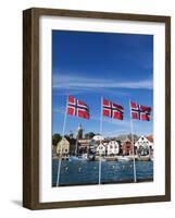 Norwegian Flags and Historic Harbour Warehouses, Stavanger, Norway, Scandinavia, Europe-Christian Kober-Framed Photographic Print