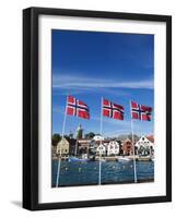 Norwegian Flags and Historic Harbour Warehouses, Stavanger, Norway, Scandinavia, Europe-Christian Kober-Framed Photographic Print