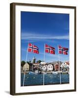Norwegian Flags and Historic Harbour Warehouses, Stavanger, Norway, Scandinavia, Europe-Christian Kober-Framed Photographic Print