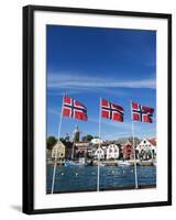 Norwegian Flags and Historic Harbour Warehouses, Stavanger, Norway, Scandinavia, Europe-Christian Kober-Framed Photographic Print