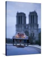 Notre Dame Cathedral and Taxi, Paris, France-Jon Arnold-Stretched Canvas