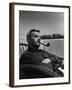 Novelist and Script Writer William Faulkner Smoking a Pipe on the Balcony of His Hotel Room-null-Framed Premium Photographic Print