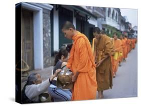 Novice Buddhist Monks Collecting Alms of Rice, Luang Prabang, Laos, Indochina, Southeast Asia, Asia-Upperhall Ltd-Stretched Canvas