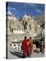 Novice Monks Walk from Village, Lamayuru Monastery, Ladakh, India-Tony Waltham-Stretched Canvas