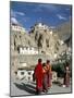 Novice Monks Walk from Village, Lamayuru Monastery, Ladakh, India-Tony Waltham-Mounted Photographic Print