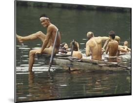 Nude Young Man on Dock, Enjoying Skinny Dipping in River at Woodstock Music and Art Festival-Bill Eppridge-Mounted Photographic Print