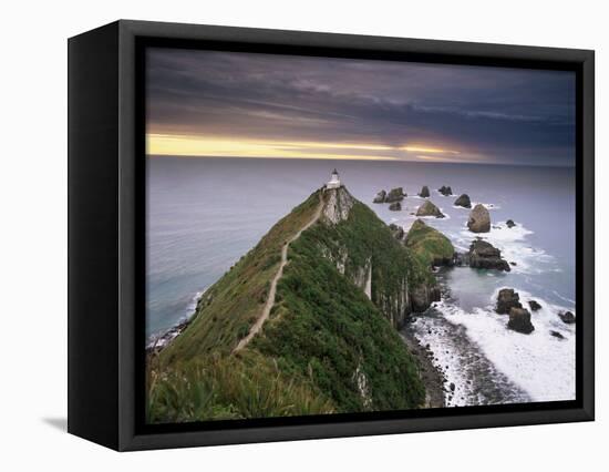 Nugget Point Lighthouse on the Coast and Overcast Sky, the Catlins, South Island, New Zealand-Gavin Hellier-Framed Stretched Canvas