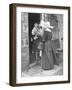 Nun from the Order of Sisters of Charity Visiting a Destitute Family with Supplies-null-Framed Photographic Print