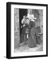 Nun from the Order of Sisters of Charity Visiting a Destitute Family with Supplies-null-Framed Photographic Print