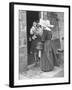 Nun from the Order of Sisters of Charity Visiting a Destitute Family with Supplies-null-Framed Photographic Print