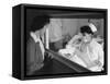 Nurse Aiko Hamaguchi shows new baby to mother in maternity ward, Manzanar War Relocation Center, CA-Ansel Adams-Framed Stretched Canvas