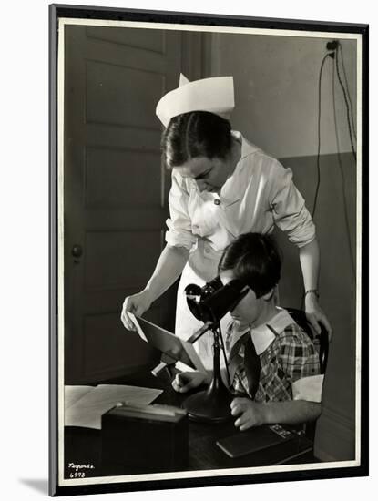 Nurse and a Visually Impaired Girl at the Clinic of the New York Association for the Blind, 114…-Byron Company-Mounted Giclee Print