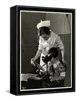 Nurse and a Visually Impaired Girl at the Clinic of the New York Association for the Blind, 114…-Byron Company-Framed Stretched Canvas