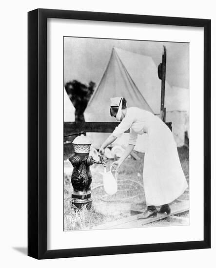 Nurse Collecting Water, USA, 1918-null-Framed Photographic Print