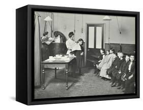 Nurse Cutting Childrens Verminous Hair, Finch Street Cleansing Station, London, 1911-null-Framed Stretched Canvas