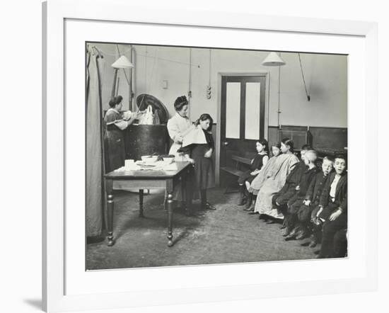 Nurse Cutting Childrens Verminous Hair, Finch Street Cleansing Station, London, 1911-null-Framed Photographic Print