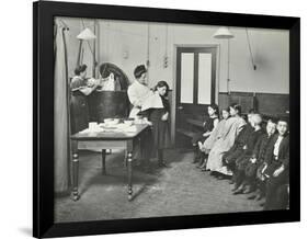 Nurse Cutting Childrens Verminous Hair, Finch Street Cleansing Station, London, 1911-null-Framed Photographic Print