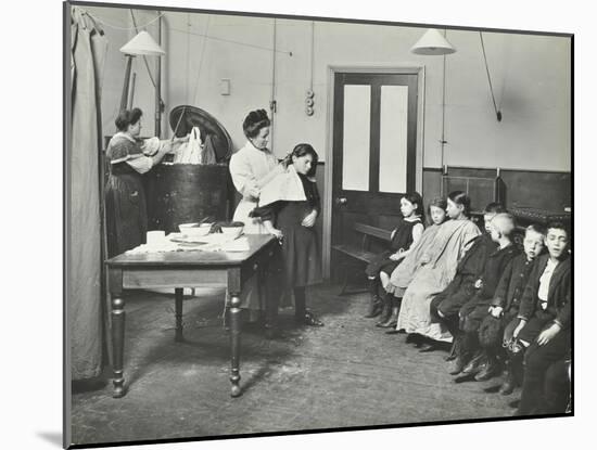 Nurse Cutting Childrens Verminous Hair, Finch Street Cleansing Station, London, 1911-null-Mounted Premium Photographic Print