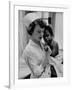 Nurse Holding African American Girl in Her Arms, Examining Her Finger-John Dominis-Framed Photographic Print