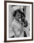 Nurse Holding African American Girl in Her Arms, Examining Her Finger-John Dominis-Framed Photographic Print