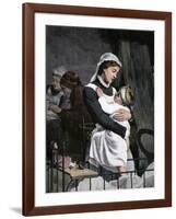 Nurse Holding Sick Child in the Children's Hospital, London, 1880s-null-Framed Giclee Print