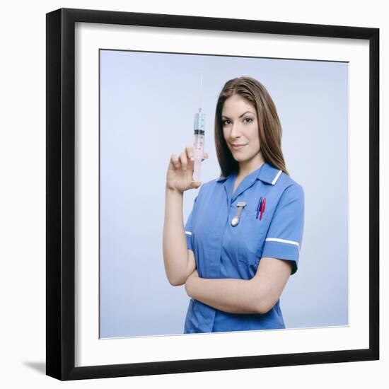 Nurse Pumping a Syringe-Kevin Curtis-Framed Premium Photographic Print
