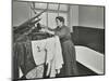 Nurse Using a Steriliser in the Bathroom at Chaucer Cleansing Station, London, 1911-null-Mounted Photographic Print