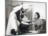 Nurse Weighs a Small Baby While Its Mother Watches-null-Mounted Photographic Print