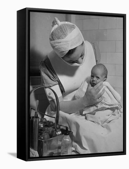 Nurse with Premature Baby-Hansel Mieth-Framed Stretched Canvas