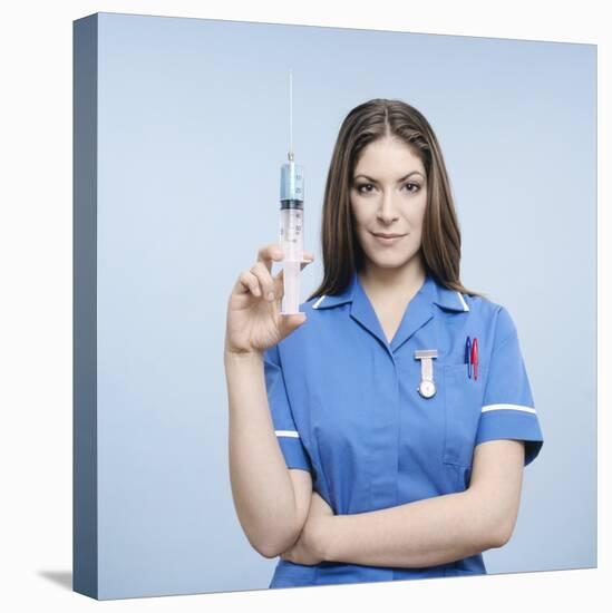 Nurse with Syringe-Kevin Curtis-Stretched Canvas