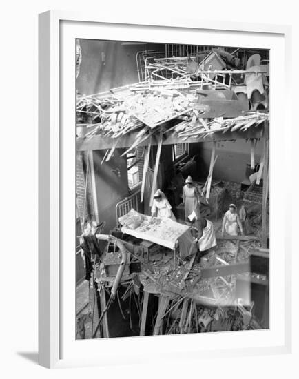 Nurses are Seen Clearing Debris from One of the Wards in St. Peter's Hospital, Stepney, East London-null-Framed Premium Photographic Print