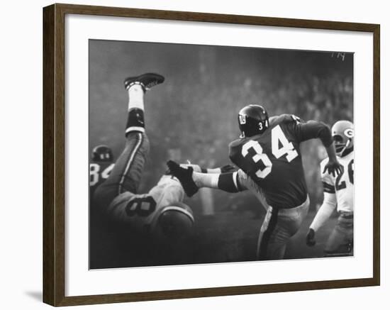 NY Giant Don Chandler Making a Punt in a Football Game Against the Green Bay Packers-John Loengard-Framed Premium Photographic Print