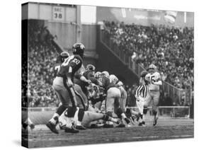 Ny Giants in Dark Jerseys, in a Football Game Against the Green Bay Packers at Yankee Stadium-John Loengard-Stretched Canvas