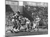 Ny Giants in Dark Jerseys, in a Football Game Against the Green Bay Packers at Yankee Stadium-John Loengard-Mounted Premium Photographic Print