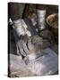 Nyagatom Woman Grinds Sorghum Using Two Stones, Omo River, South-Western Ethiopia-John Warburton-lee-Stretched Canvas