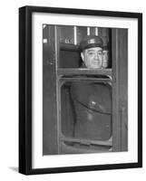 Nyc Mayor Fiorello Laguardia Wearing Motorman's Cap and Looking Out Window on Subway-null-Framed Photographic Print