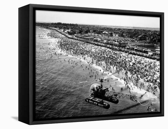 NYC Police Helicopter Hovering over Independence Day Crowd at Beach at Far Rockaway-null-Framed Stretched Canvas