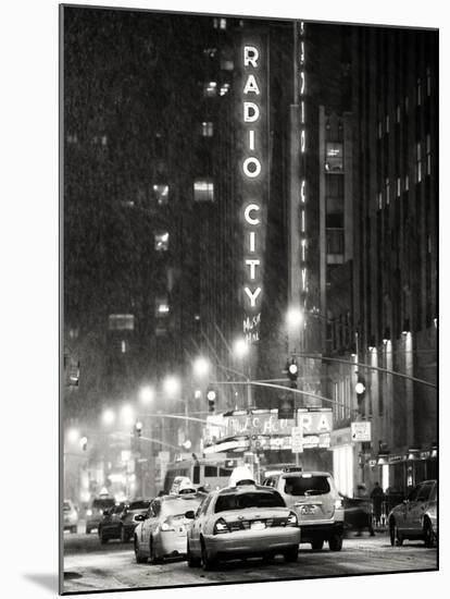 NYC Yellow Taxis in Manhattan under the Snow in front of the Radio City Music Hall-Philippe Hugonnard-Mounted Photographic Print