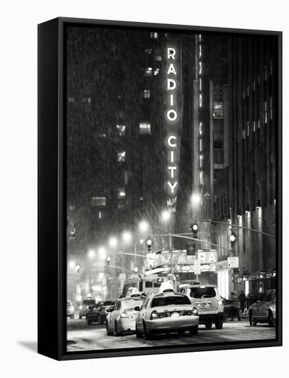 NYC Yellow Taxis in Manhattan under the Snow in front of the Radio City Music Hall-Philippe Hugonnard-Framed Stretched Canvas