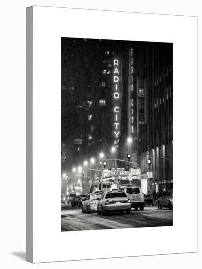 NYC Yellow Taxis in Manhattan under the Snow in front of the Radio City Music Hall-Philippe Hugonnard-Stretched Canvas