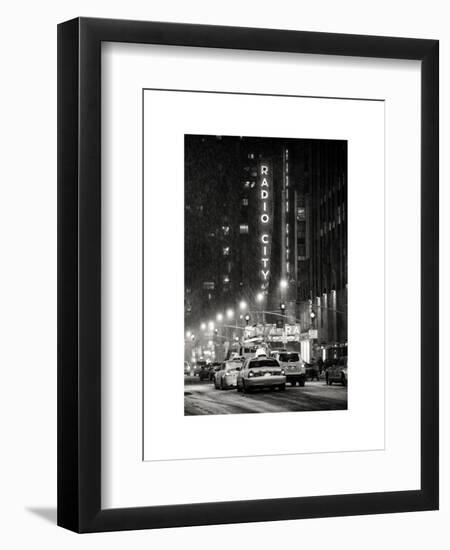 NYC Yellow Taxis in Manhattan under the Snow in front of the Radio City Music Hall-Philippe Hugonnard-Framed Art Print