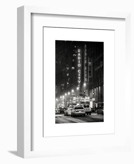 NYC Yellow Taxis in Manhattan under the Snow in front of the Radio City Music Hall-Philippe Hugonnard-Framed Art Print