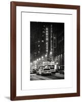 NYC Yellow Taxis in Manhattan under the Snow in front of the Radio City Music Hall-Philippe Hugonnard-Framed Art Print